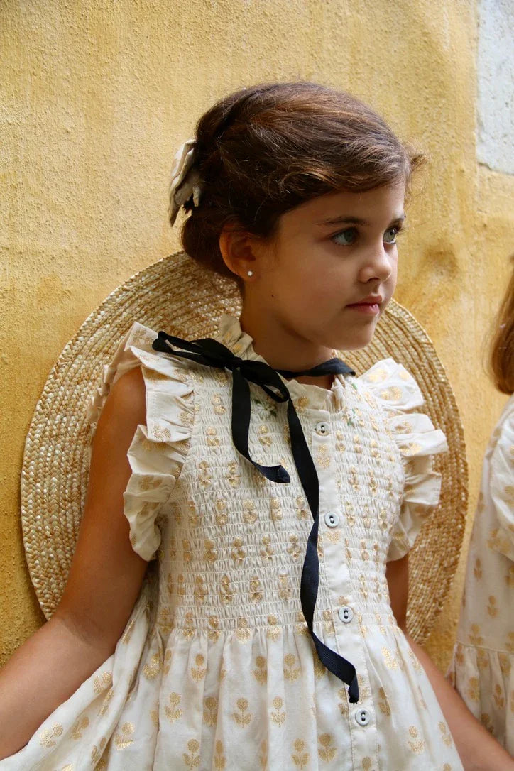 Robe longue fleur dorée sur ivoire